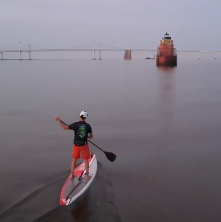 Hopkinson paddling the bay